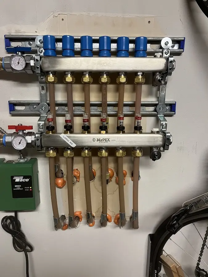 Plumber performing Gas Leak Detection at a residential property in East Haddam